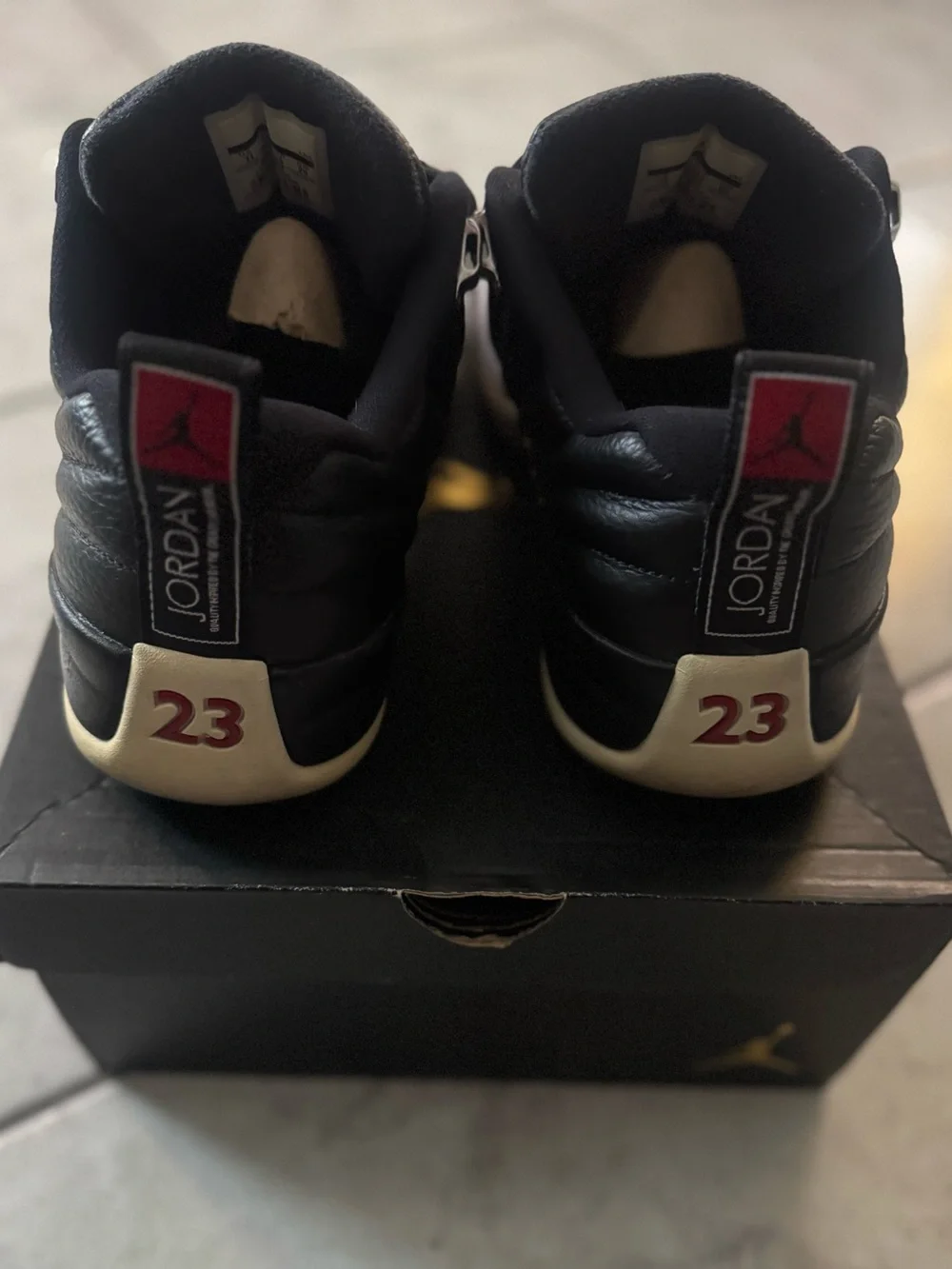 Jordan Men's Retro 12 Low-Top Sneakers in Black and White